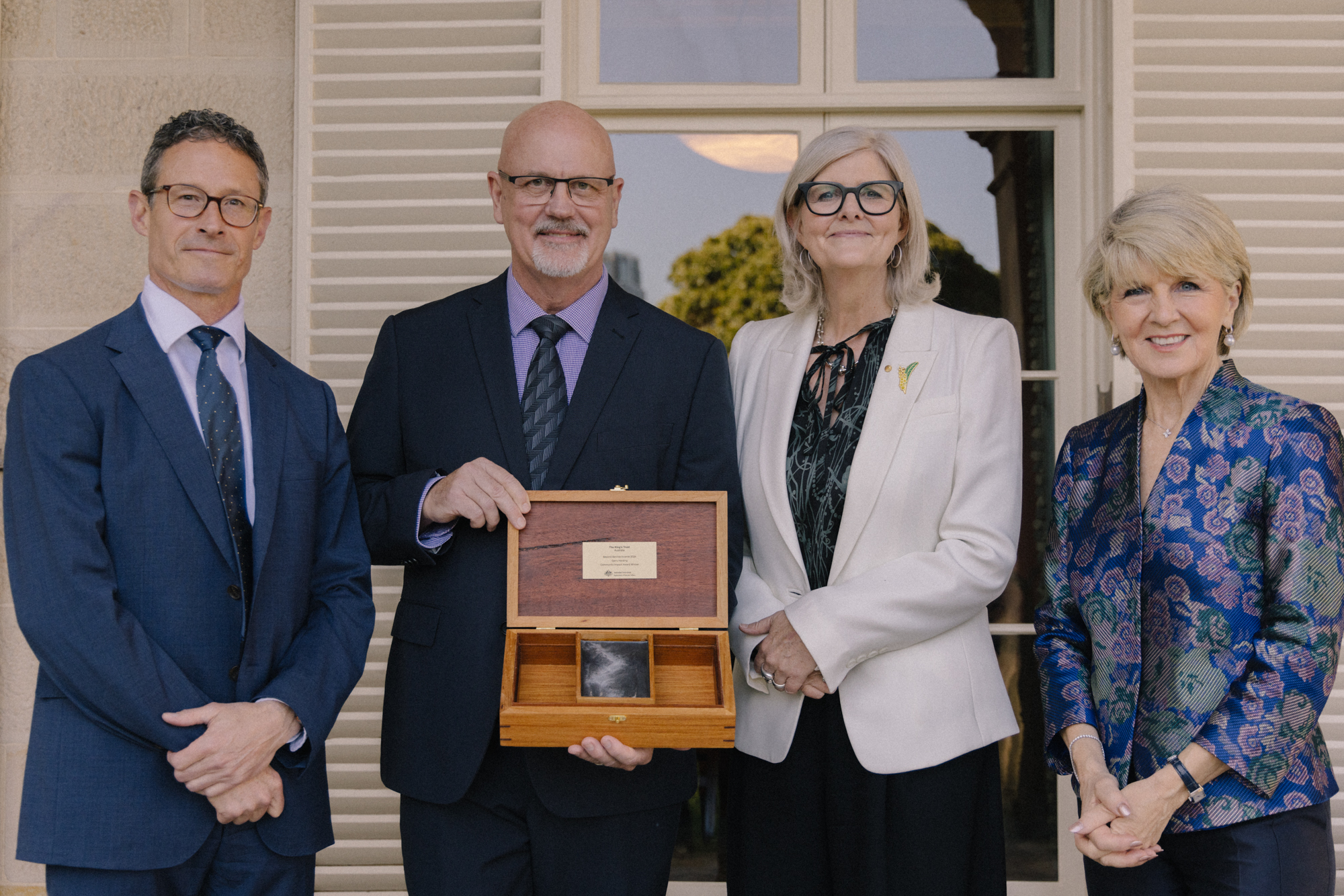 Community Impact Award Winner Garry Harding pictured with Brigadier Mark Brewer, Her Excellency Samantha Mostyn and The Hon Julie Bishop.